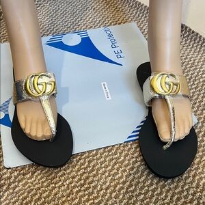 Gucci Gold Metallic Thong Sandals with Black Footbed